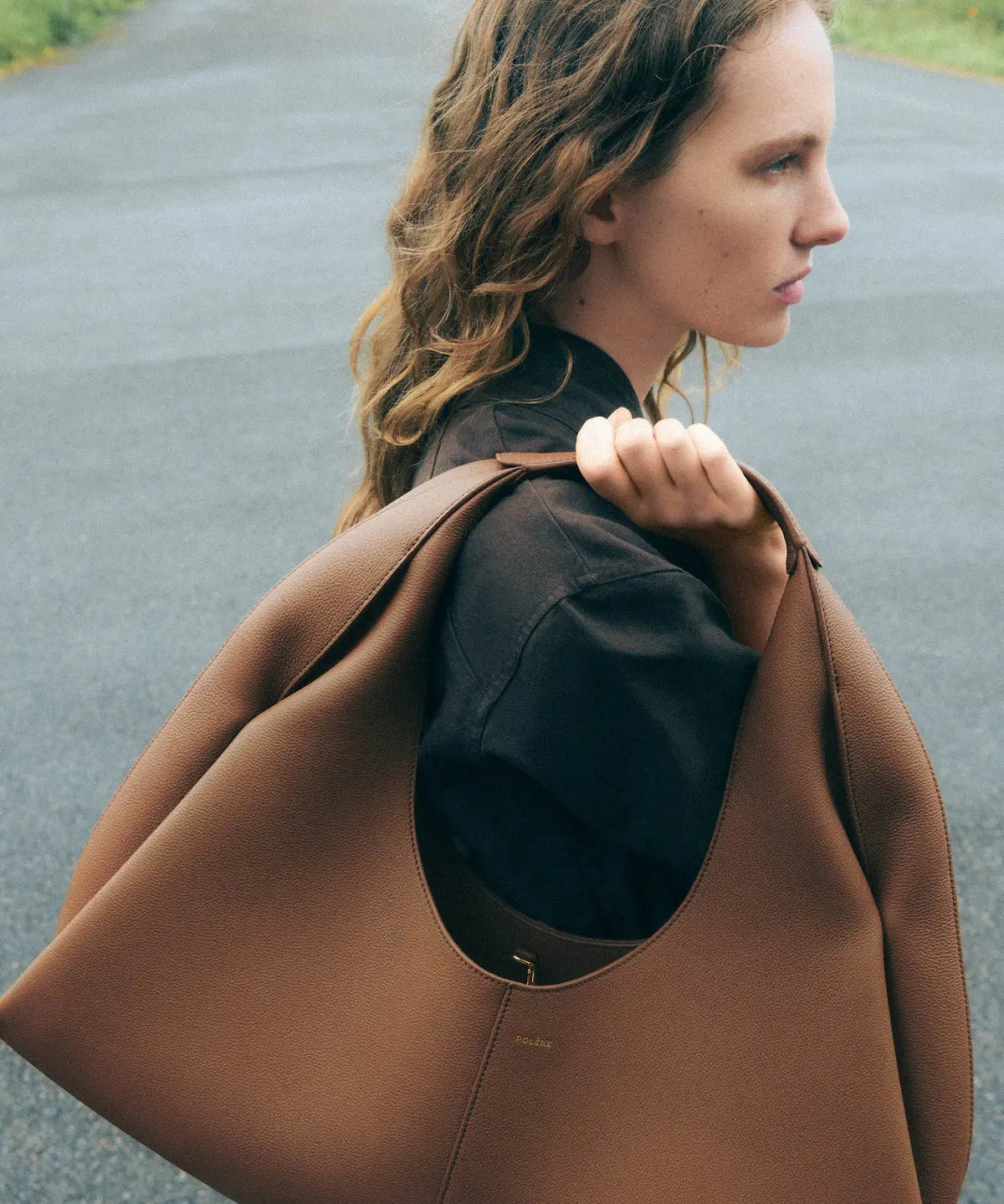 Selene dark blue handbag interior and styling detail by Apples UAE