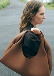 Selene dark blue handbag interior and styling detail by Apples UAE